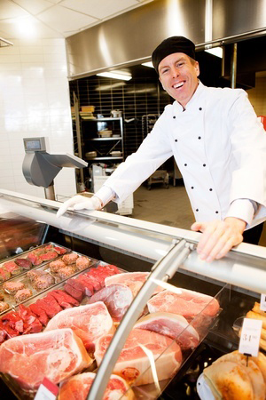 butcher-behind-meat-counter